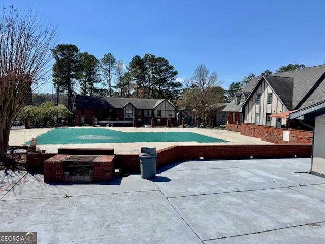 6851 Roswell Rd Unit D2, Atlanta, GA 30328 - view of pool with a covered pool and a patio area