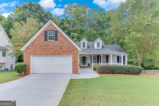 3238 Sharp Creek Ln, Buford, GA 30519 - view of front of home featuring a porch, driveway, a garage, brick siding, and a front lawn
