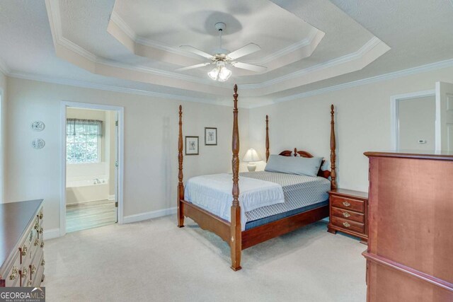 3238 Sharp Creek Ln, Buford, GA 30519 - bedroom featuring a tray ceiling, ensuite bath, ornamental molding, and light carpet