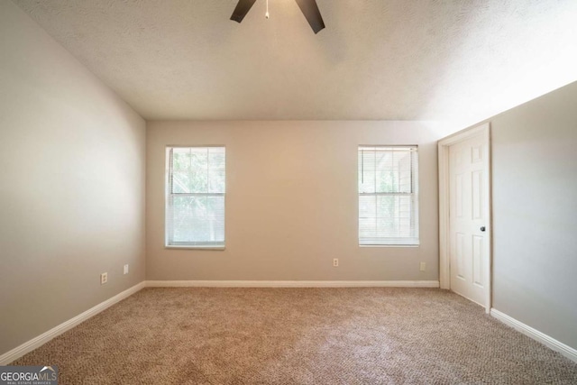 2132 Sara Ashley Way, Lithonia, GA 30058 - carpeted spare room featuring ceiling fan, baseboards, and a textured ceiling