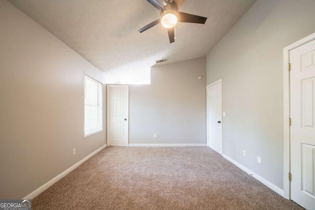 2132 Sara Ashley Way, Lithonia, GA 30058 - spare room with carpet floors, ceiling fan, and baseboards