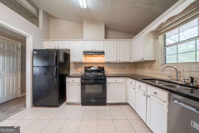 2132 Sara Ashley Way, Lithonia, GA 30058 - kitchen featuring black appliances, under cabinet range hood, vaulted ceiling, a sink, and decorative backsplash