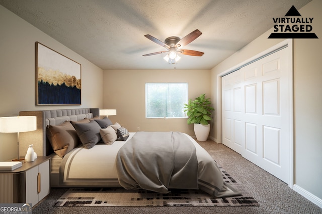 2132 Sara Ashley Way, Lithonia, GA 30058 - carpeted bedroom featuring baseboards, ceiling fan, and a textured ceiling