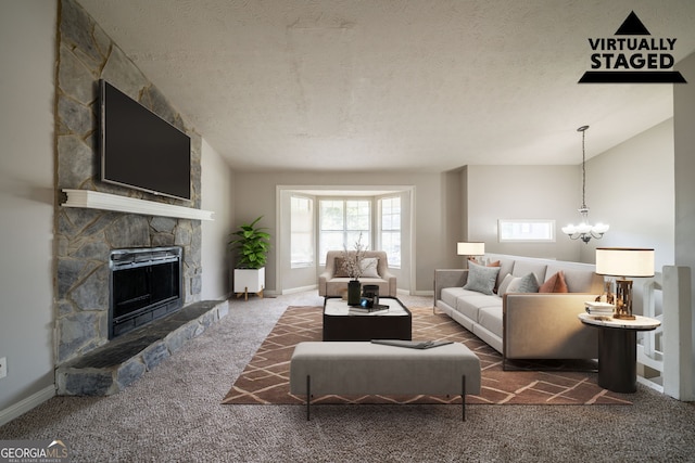 2132 Sara Ashley Way, Lithonia, GA 30058 - living room featuring carpet, a chandelier, a fireplace, a textured ceiling, and baseboards