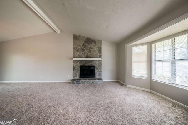 2132 Sara Ashley Way, Lithonia, GA 30058 - unfurnished living room with light colored carpet, a fireplace, and baseboards