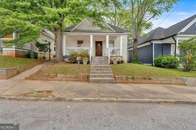 902 Allene Ave SW, Atlanta, GA 30310 - view of front of home with covered porch and a front yard