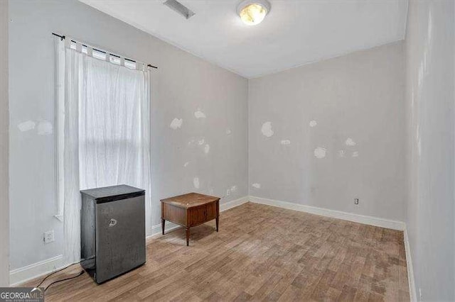 902 Allene Ave SW, Atlanta, GA 30310 - spare room featuring baseboards and wood finished floors