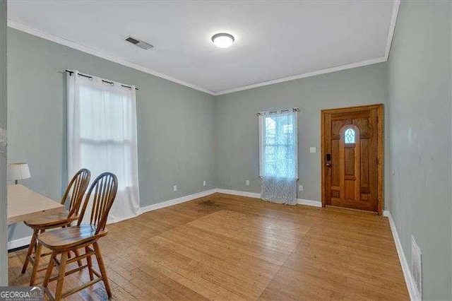 902 Allene Ave SW, Atlanta, GA 30310 - interior space featuring crown molding, baseboards, light wood-style flooring, and visible vents