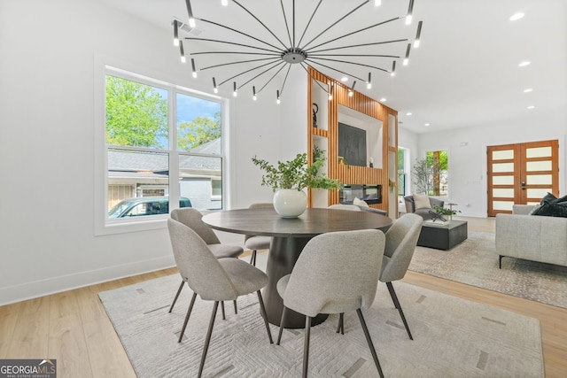 34 Candler Rd NE, Atlanta, GA 30317 - dining room featuring recessed lighting, baseboards, a wealth of natural light, and wood finished floors