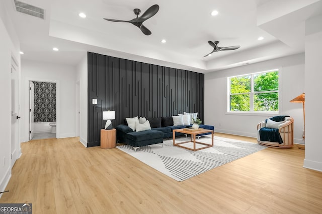 34 Candler Rd NE, Atlanta, GA 30317 - living area featuring a raised ceiling, a ceiling fan, and wood finished floors