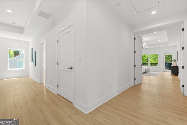 34 Candler Rd NE, Atlanta, GA 30317 - hall featuring a raised ceiling, attic access, recessed lighting, light wood-type flooring, and visible vents