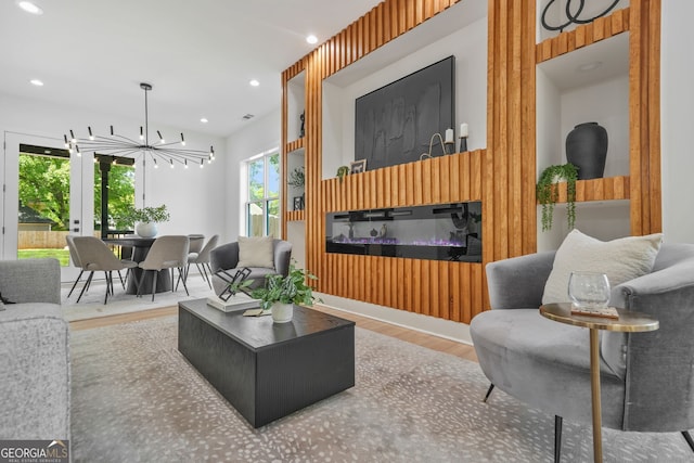 34 Candler Rd NE, Atlanta, GA 30317 - living room with recessed lighting, wood finished floors, a chandelier, and visible vents