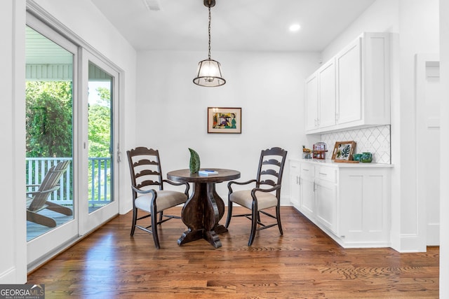 703 Cherokee Hls, Hiawassee, GA 30546 - dining area with dark wood finished floors, recessed lighting, and plenty of natural light