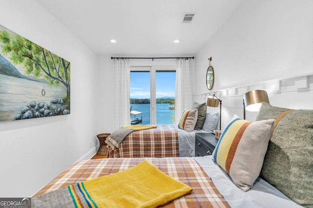 703 Cherokee Hls, Hiawassee, GA 30546 - bedroom with a water view, visible vents, and recessed lighting