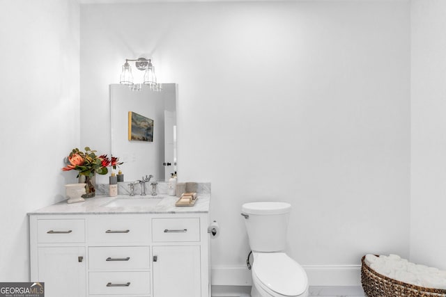 703 Cherokee Hls, Hiawassee, GA 30546 - bathroom with vanity, toilet, and baseboards
