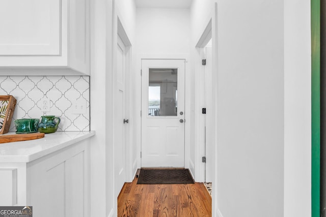 703 Cherokee Hls, Hiawassee, GA 30546 - doorway to outside featuring wood finished floors