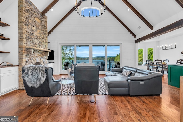 703 Cherokee Hls, Hiawassee, GA 30546 - living room with beamed ceiling, a notable chandelier, high vaulted ceiling, and plenty of natural light