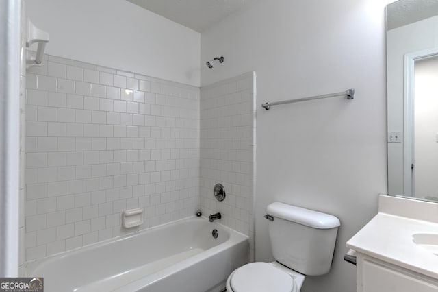 full bathroom featuring vanity,  shower combination, and toilet