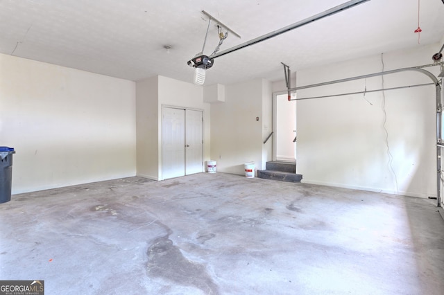 garage featuring a garage door opener