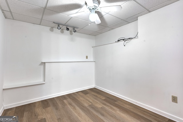 2869 Hickory Run Cir, Duluth, GA 30096 - finished basement with baseboards, ceiling fan, wood finished floors, and a paneled ceiling
