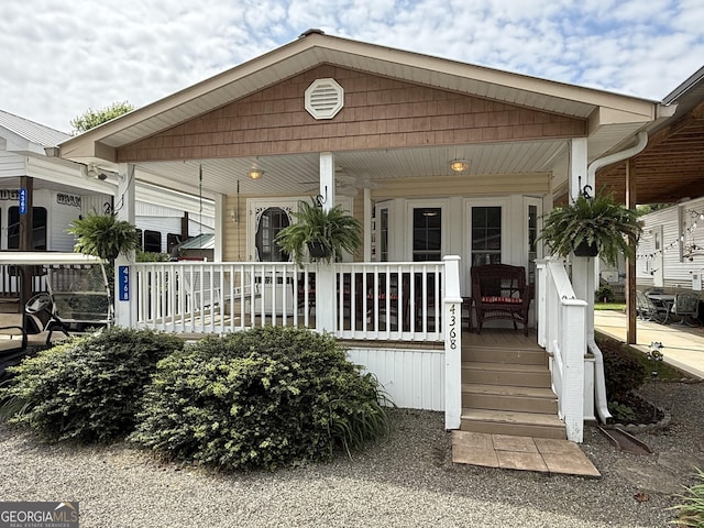 view of front of property featuring covered porch
