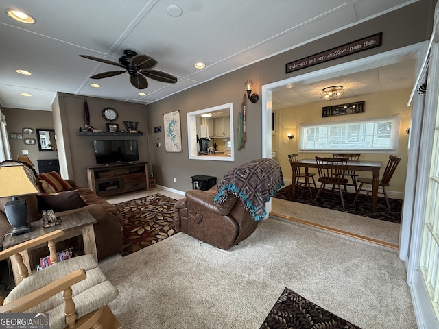 carpeted living room featuring recessed lighting, ceiling fan, and baseboards