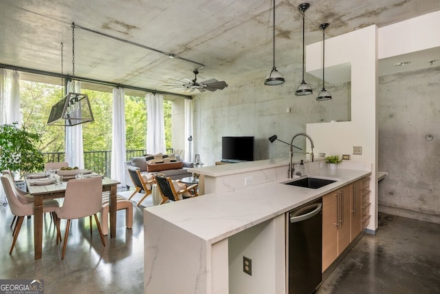 kitchen with decorative light fixtures, open floor plan, concrete floors, and a sink