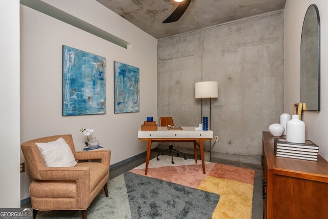office area with a ceiling fan