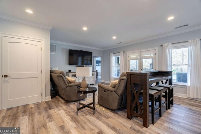 431 Tralee Ct, Statham, GA 30666 - living room with light wood-style floors, recessed lighting, and crown molding