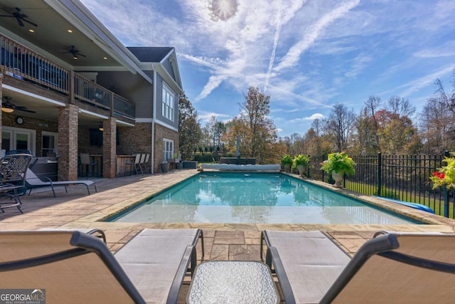 431 Tralee Ct, Statham, GA 30666 - view of pool featuring a ceiling fan and a patio area