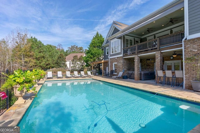 431 Tralee Ct, Statham, GA 30666 - view of swimming pool featuring ceiling fan and a patio area