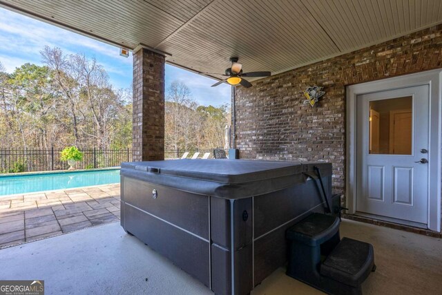 431 Tralee Ct, Statham, GA 30666 - view of patio / terrace featuring a hot tub and a ceiling fan