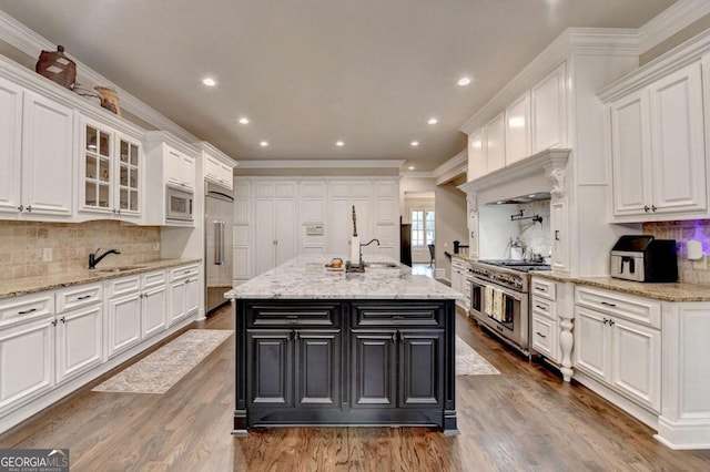 1898 Sam Snead Dr, Braselton, GA 30517 - kitchen with built in appliances and white cabinetry