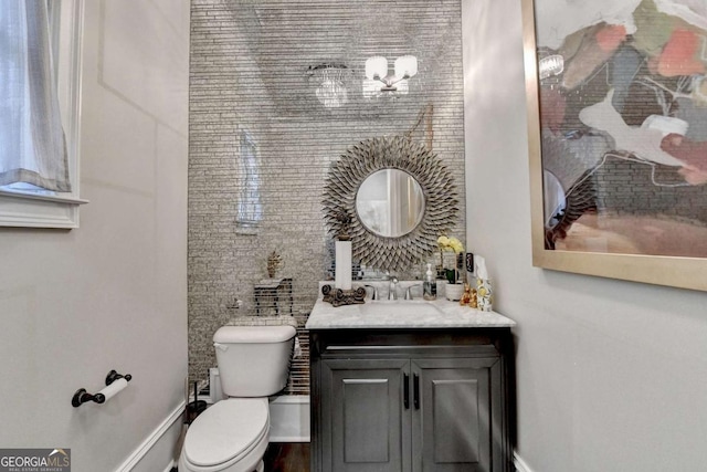 1898 Sam Snead Dr, Braselton, GA 30517 - bathroom with toilet, baseboards, and vanity
