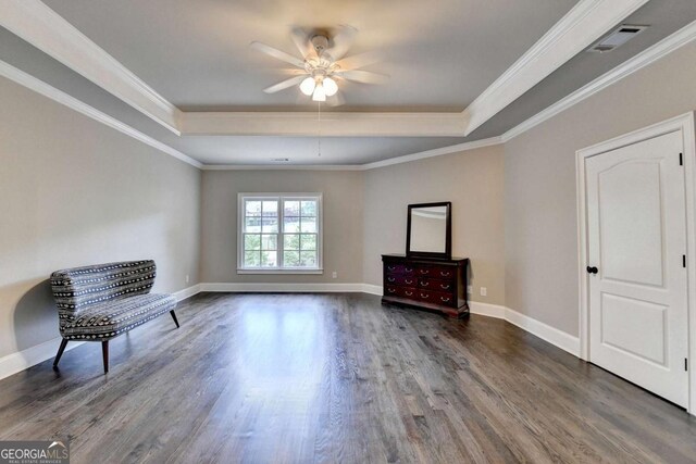 1898 Sam Snead Dr, Braselton, GA 30517 - unfurnished room featuring visible vents, baseboards, ceiling fan, a tray ceiling, and dark wood finished floors
