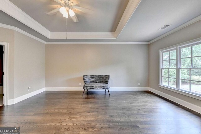 1898 Sam Snead Dr, Braselton, GA 30517 - unfurnished room featuring a ceiling fan, visible vents, crown molding, dark wood-style floors, and a tray ceiling