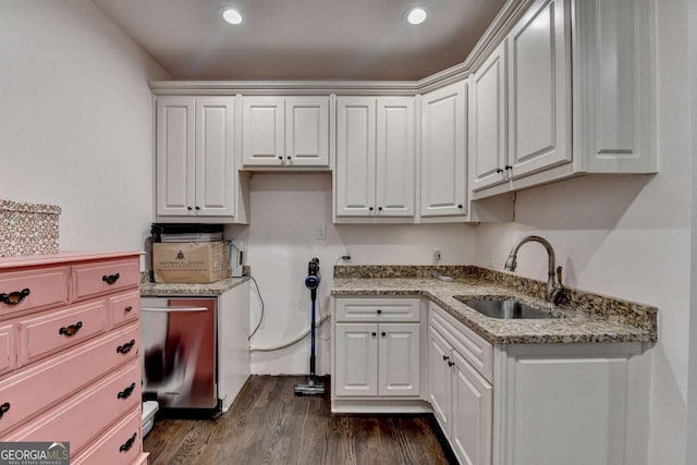 1898 Sam Snead Dr, Braselton, GA 30517 - laundry room with recessed lighting, a sink, and dark wood-style flooring