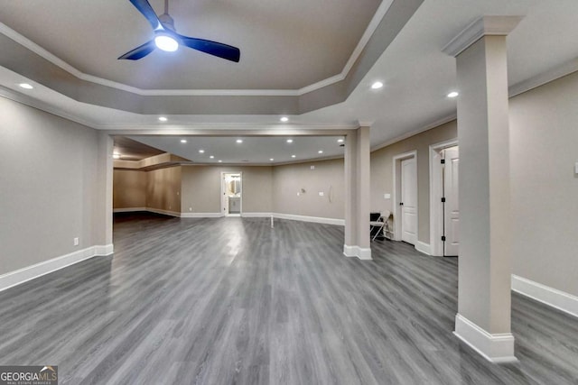 1898 Sam Snead Dr, Braselton, GA 30517 - unfurnished living room featuring crown molding, a ceiling fan, baseboards, and wood finished floors