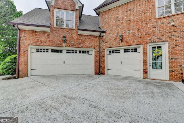1898 Sam Snead Dr, Braselton, GA 30517 - garage featuring driveway