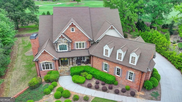 1898 Sam Snead Dr, Braselton, GA 30517 - view of front of house with brick siding and golf course view