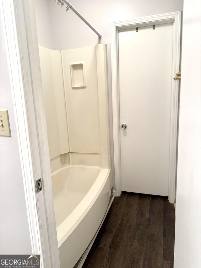 full bathroom featuring shower / bathtub combination and wood finished floors