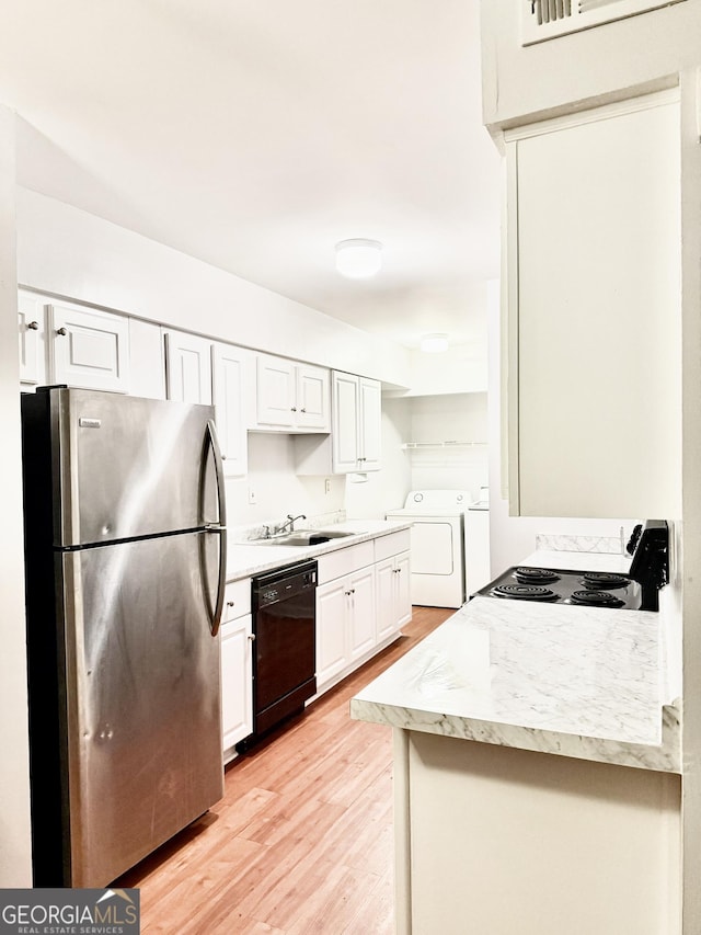 1448 Pine Log Rd NE Unit C, Conyers, GA 30012 - kitchen with freestanding refrigerator, dishwasher, washing machine and clothes dryer, electric range, and a sink