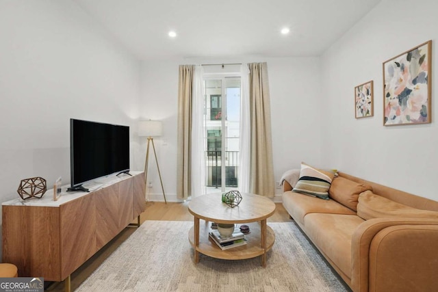 230 New St Unit 2102, Decatur, GA 30030 - living room featuring light wood-style floors and recessed lighting