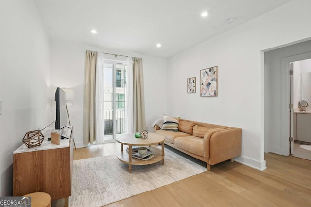 230 New St Unit 2102, Decatur, GA 30030 - living area with light wood-style floors and recessed lighting