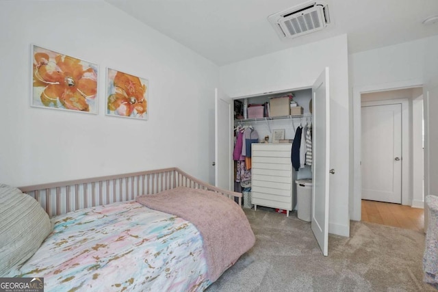 230 New St Unit 2102, Decatur, GA 30030 - carpeted bedroom featuring a closet