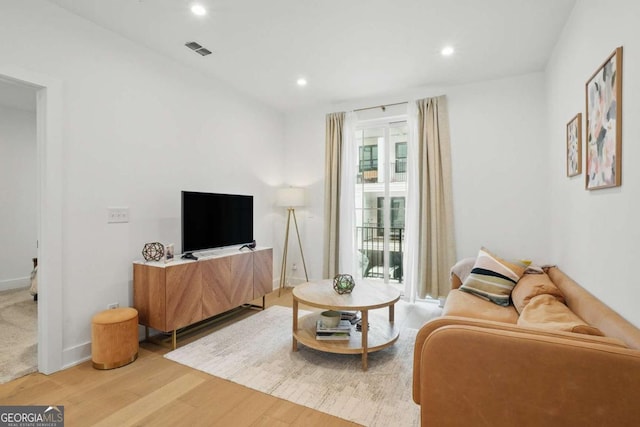 230 New St Unit 2102, Decatur, GA 30030 - living room featuring light wood-style floors and recessed lighting
