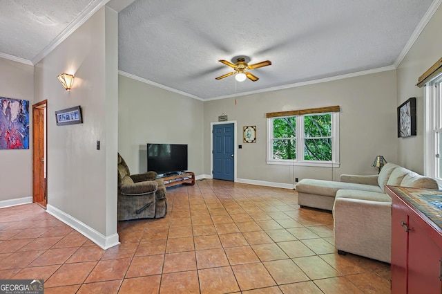 100 Tanglewood Rd, Eatonton, GA 31024 - living area with crown molding, baseboards, ceiling fan with notable chandelier, and light tile patterned flooring