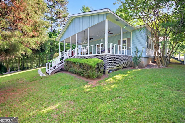 100 Tanglewood Rd, Eatonton, GA 31024 - view of property exterior with a lawn and central air condition unit