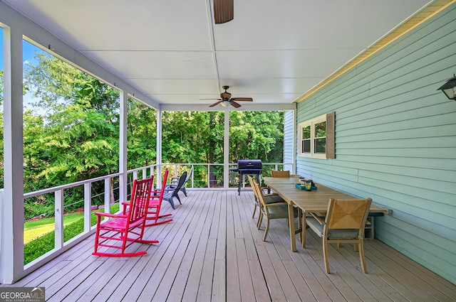 100 Tanglewood Rd, Eatonton, GA 31024 - deck with a ceiling fan and outdoor dining space