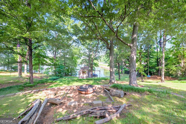 100 Tanglewood Rd, Eatonton, GA 31024 - view of yard featuring an outdoor fire pit